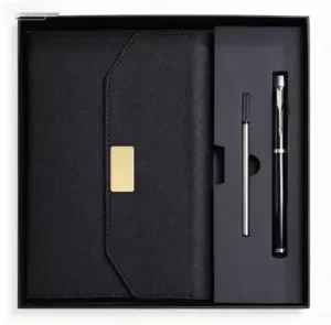 executive-black-leatherette-journal-pen-gift-set.jpg Luxury black leatherette journal set with a magnetic gold flap closure, metal rollerball pen, and extra ink refill inside a black presentation box.