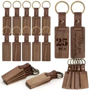 Rectangular blank wooden keychains with leather straps and metal key rings for DIY laser engraving and crafting.