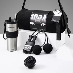 Product listing for the Get in the Rhythm Employee Wellness Kit featuring a black duffel bag, stainless steel tumbler, cordless jump rope, and black massage ball.